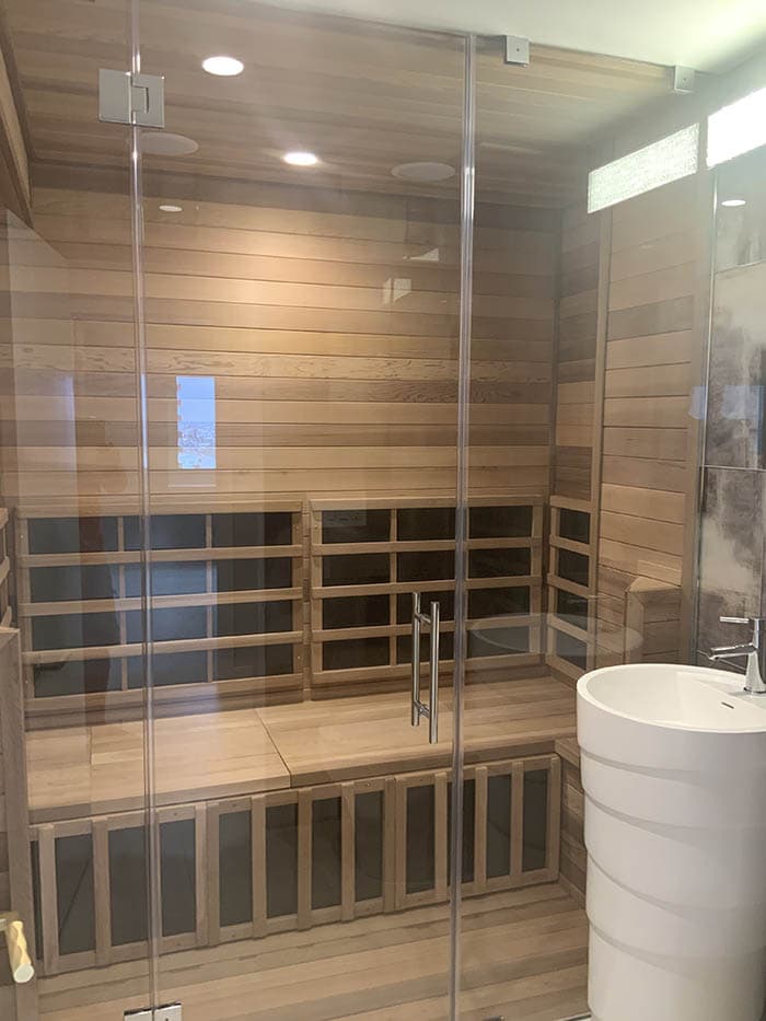 Custom infrared sauna demonstrating far infrared heater panel technology