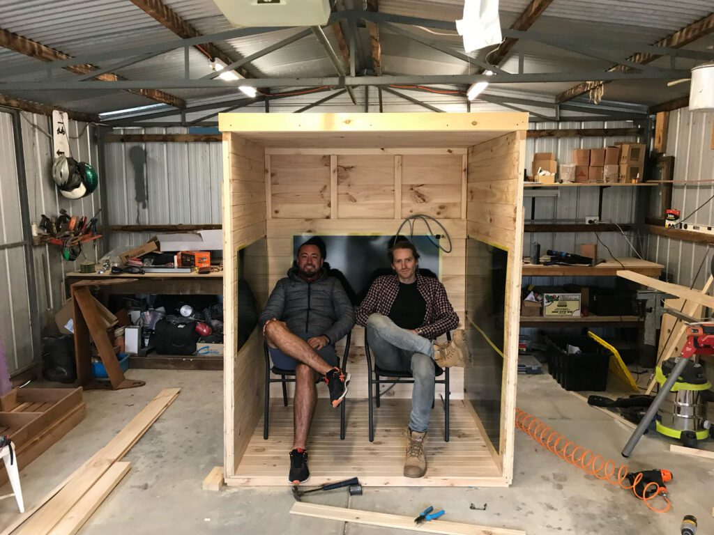 Allan and Chris collaborating on a custom sauna build